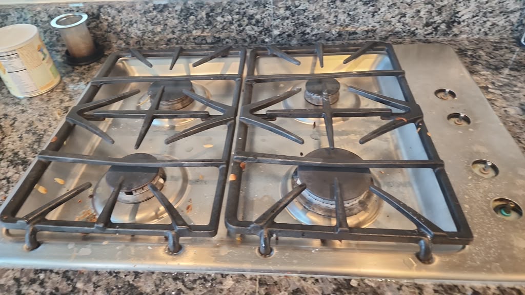 Stove with grease and food stains before cleaning
